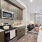 a kitchen with dark cabinets