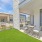 Oversized patio with turf-yard